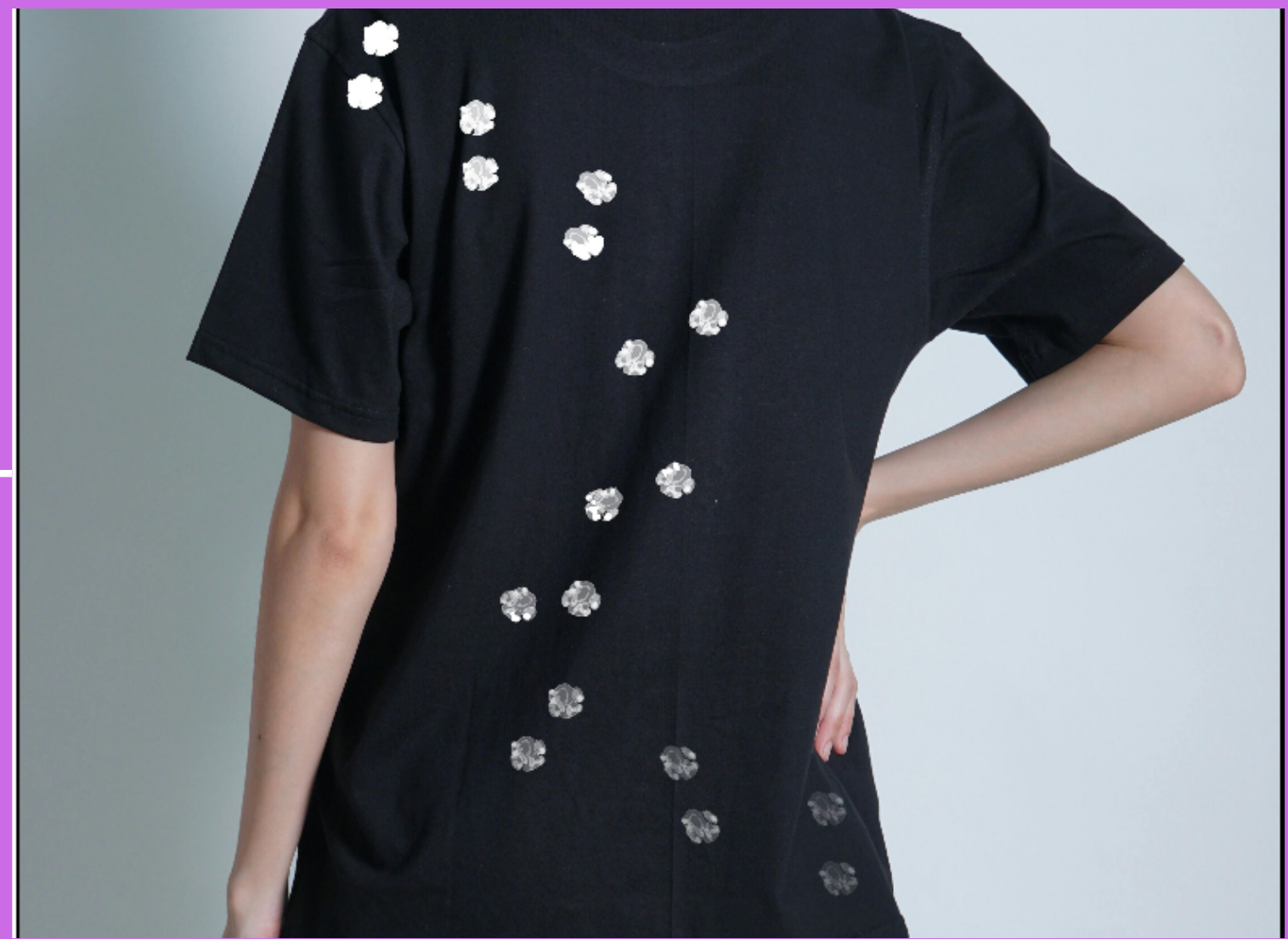 Close detail of the diagonal fading footprint trail, shown on the tee — the hoodie back uses the same technique